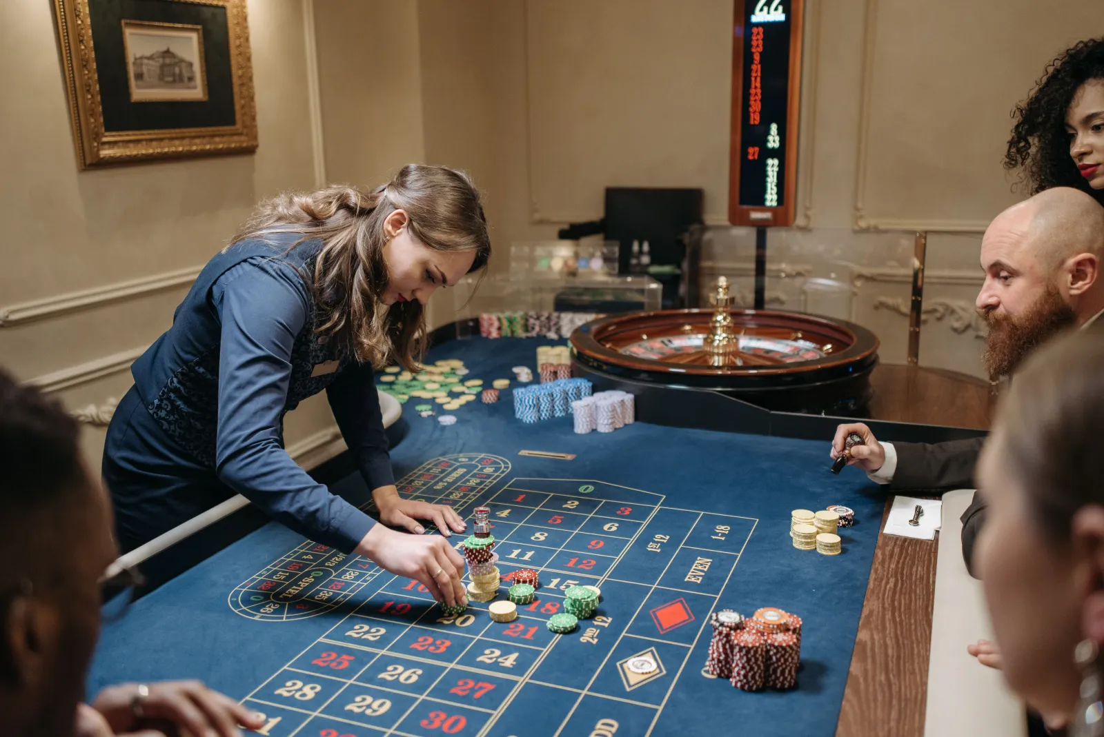 A croupier works a roulette table at a Las Vegas casino.